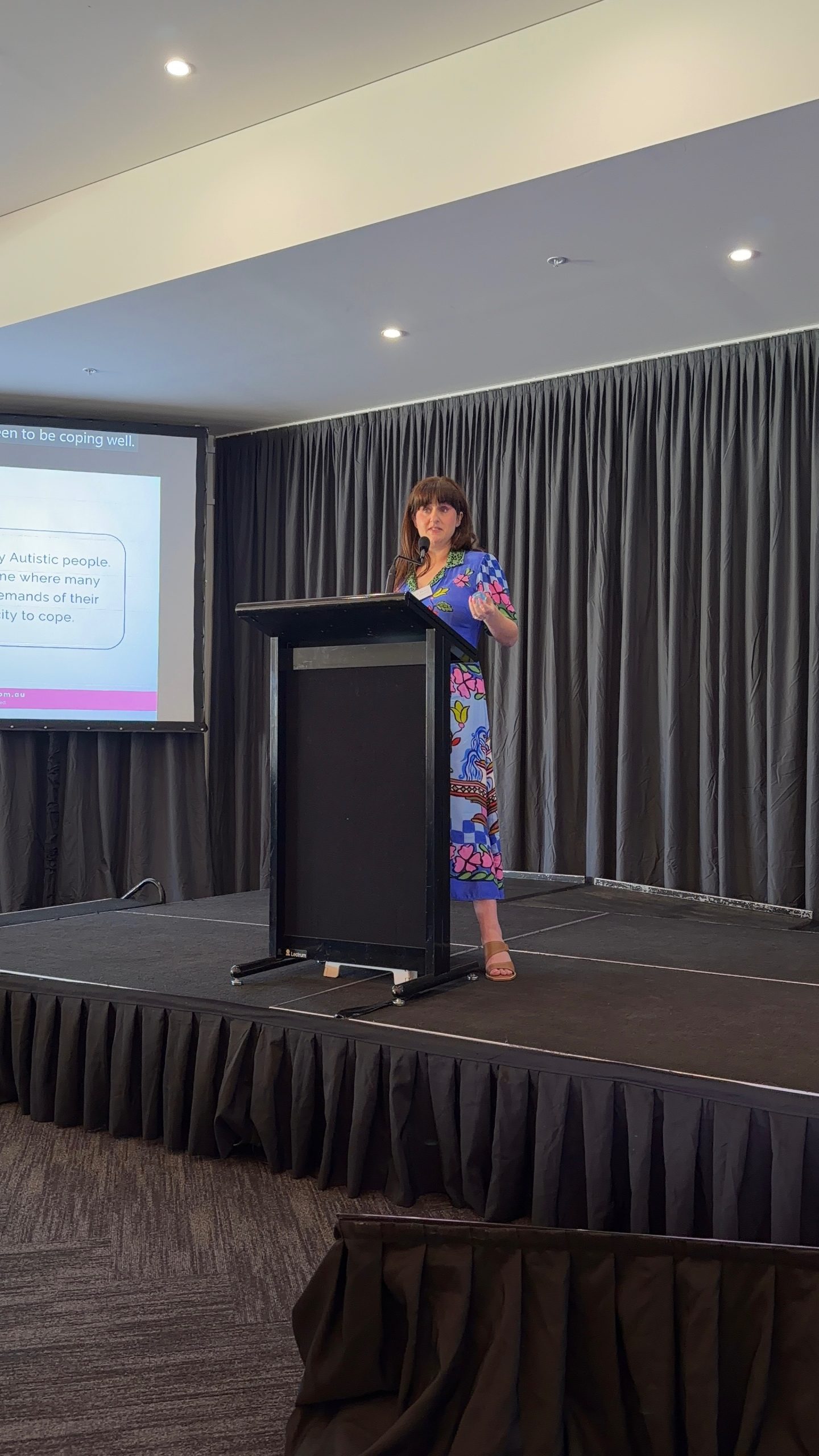 Amanda Moses speaking at a conference